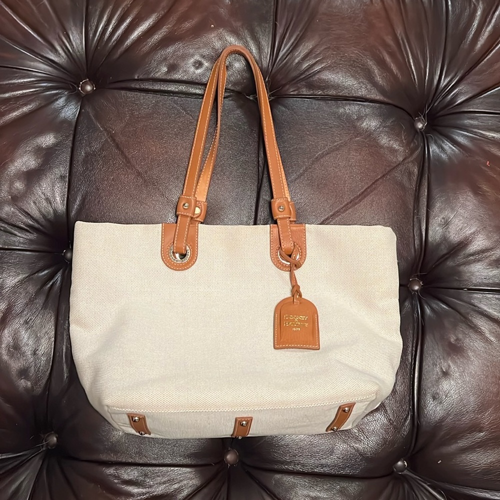 Dooney & Bourke natural white cloth bag with tan leather detailing